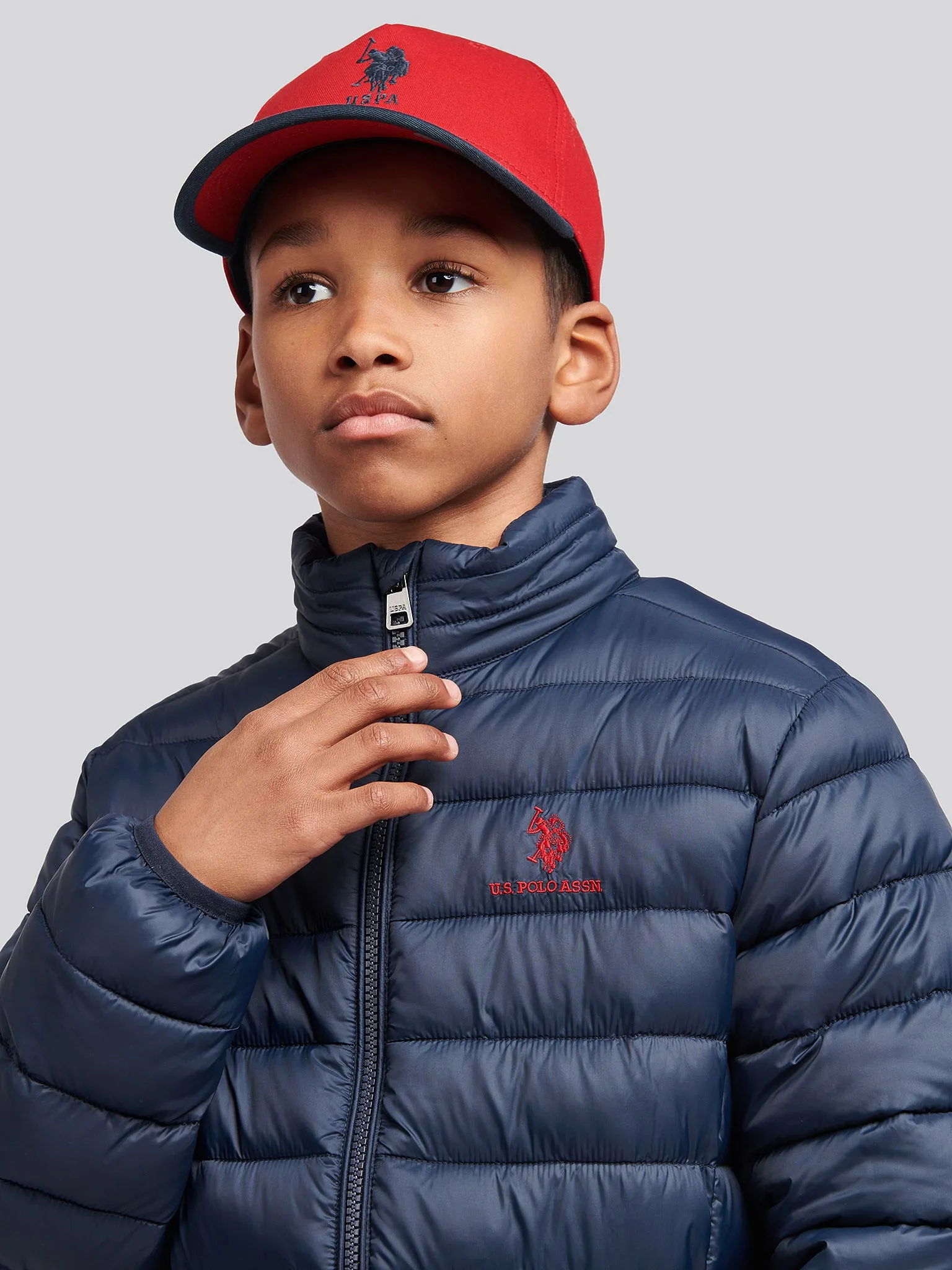 Boys Lightweight Bound Quilted Jacket in Dark Sapphire Navy / Haute Red DHM